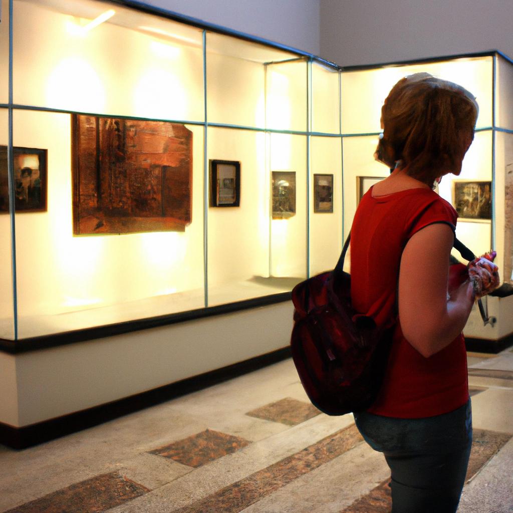 Person visiting museum exhibits artwork